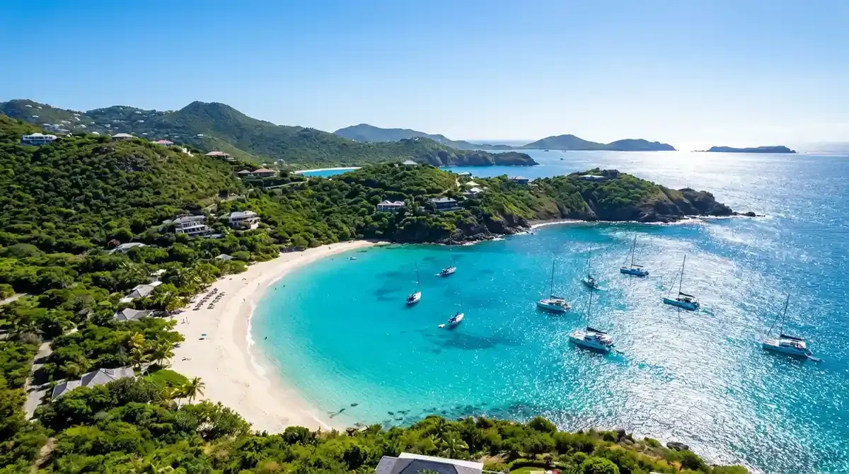 Aerial view of Colombier Beach St Barts with turquoise water and sailboats