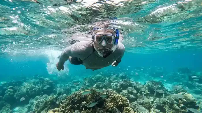 Snorkeling in the clear turquoise waters of Colombier Beach St Barts